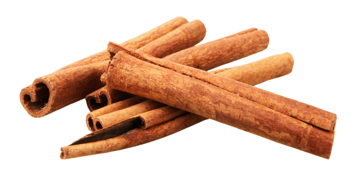 Cinnamon sticks on a black background.