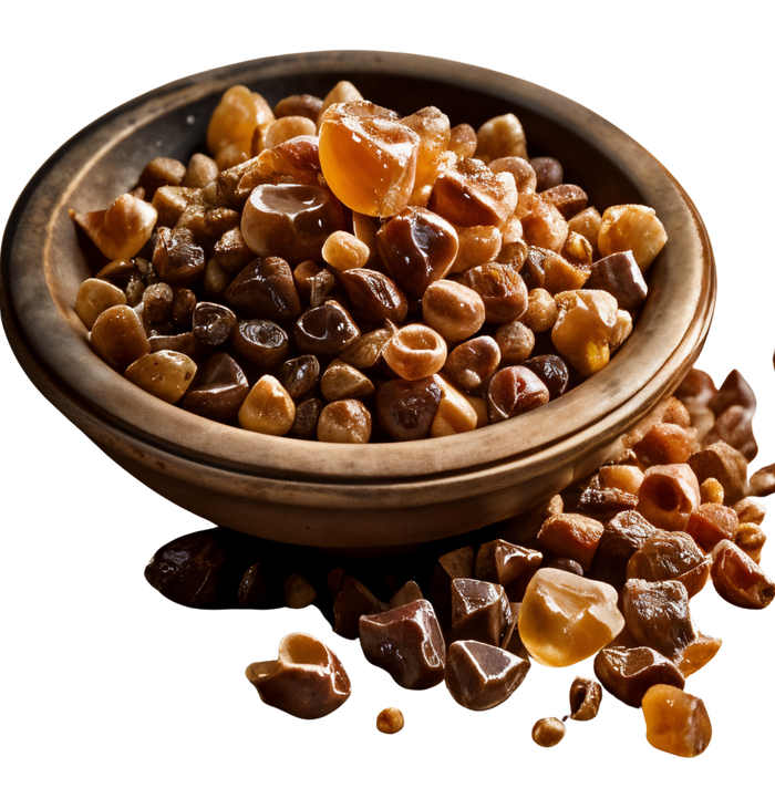 Bowl filled with amber-colored, rounded stones.