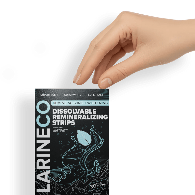 Hand holding LARIENCO dissolvable remineralizing strips.